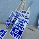 Discarded picket signs from the current auto worker strike