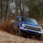 The Ford F-150 Lightning Switchgear concept throws up dirt while off-roading