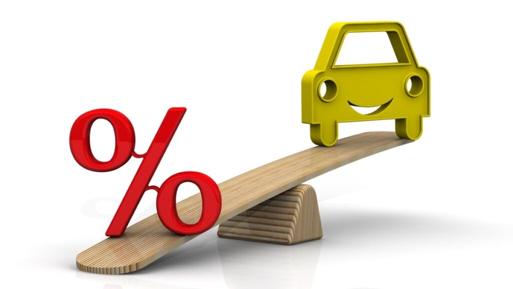 Percentage sign and car on a teeter-totter